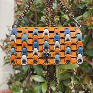 EUC COACH DINKIER WITH COLORBLOCK COACH LINK (86832)